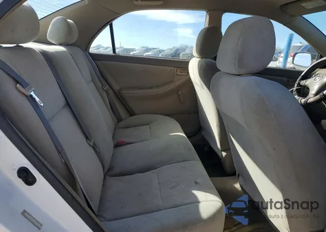 2004 Toyota Corolla Ce z USA, uszkodzony, nr VIN JTDBR32E142036119